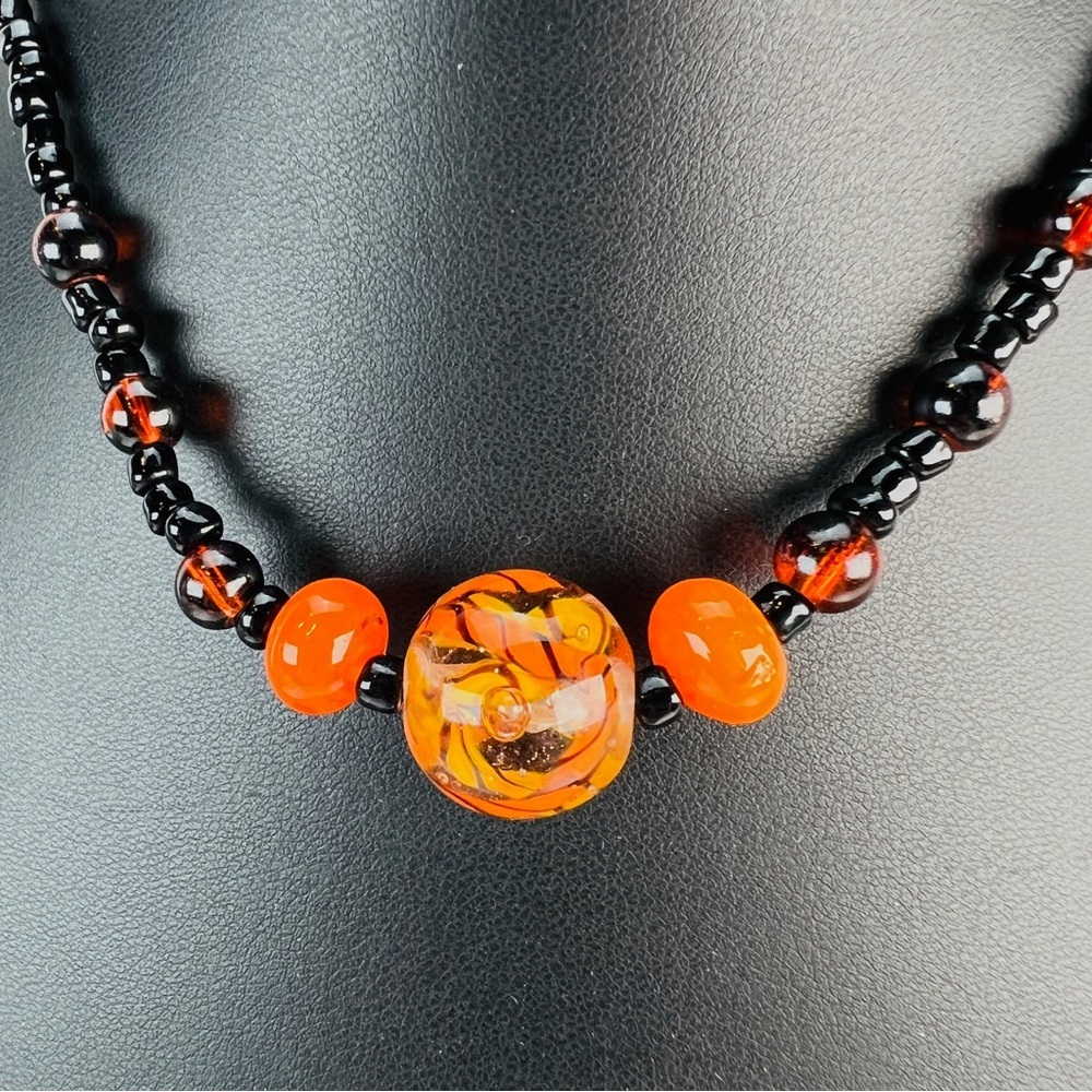 Super pretty black and orange costume necklace